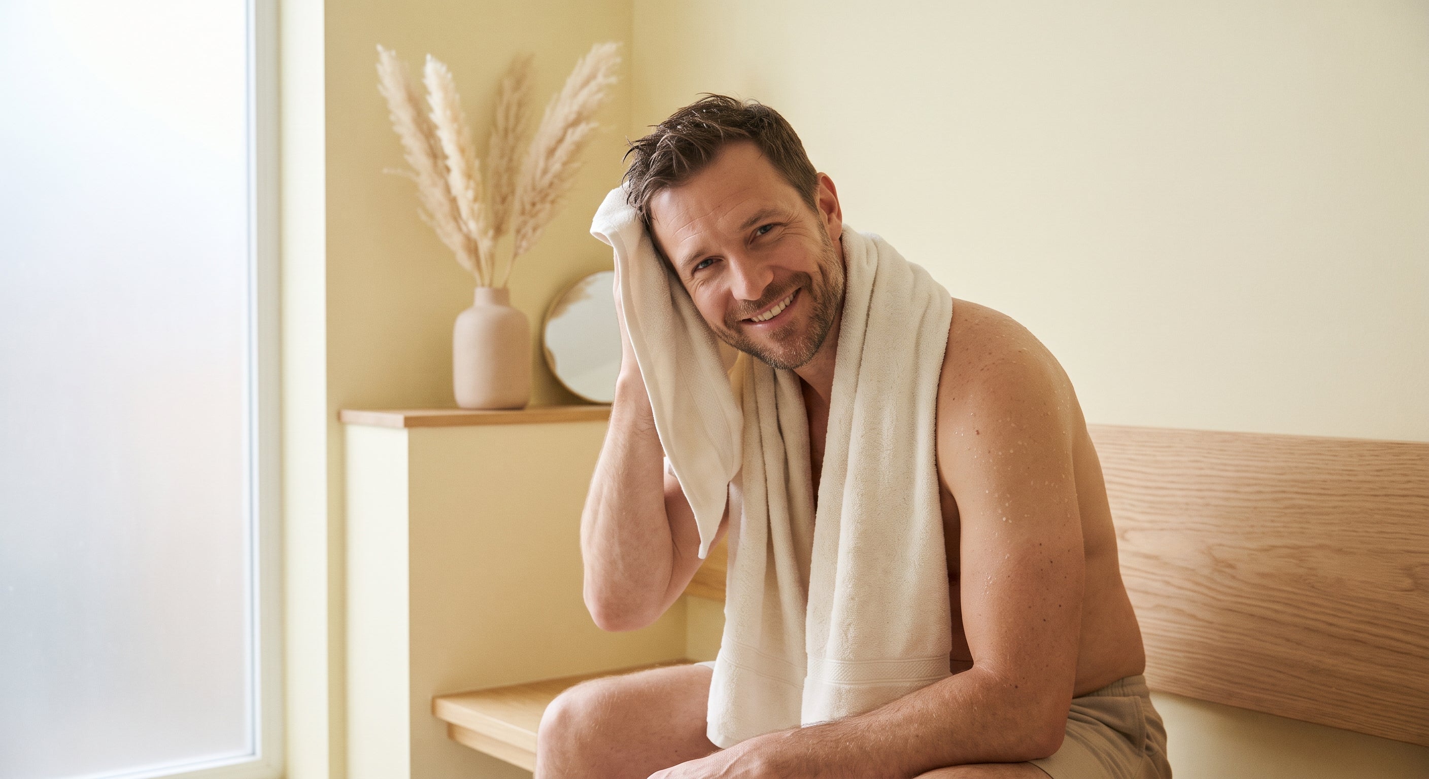 Man Sitting Drying Hair